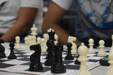 Strategic Chess Game in Progress: Close-Up View of Chess Board and Pieces Stock Photos