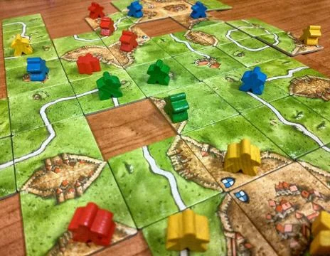 Strategy board game, set inspired by the medieval town of Carcassonne Stock Photos