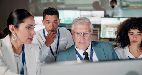 Strategy, planning and security team at computer in control room for satellite Stock Footage 286309314