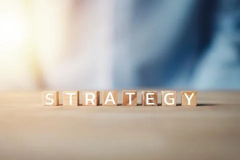 Strategy text on the woods block square. Business strategy, Action plan, Go.. Stock Photos