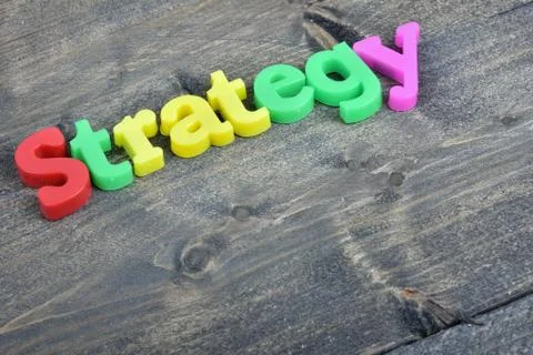 Strategy on wooden table Stock Photos