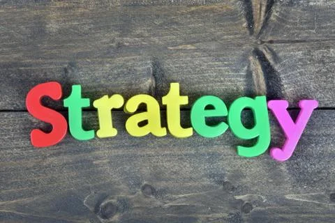 Strategy on wooden table 库存照片