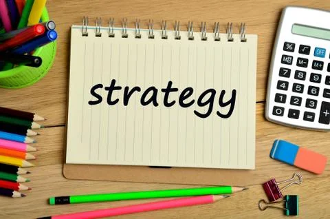 Strategy word on notebook 스톡 사진
