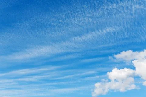 Stratocumulus clouds and the dark blue sky Stock Photos