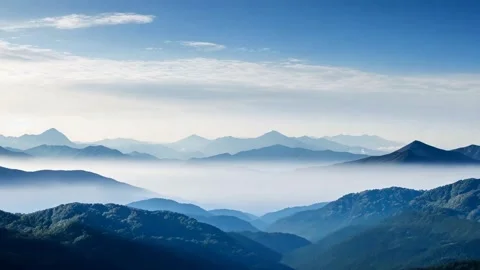 Stratus Clouds Rolling Over Blue Mountain Ranges | Cinematic 4k Timelapse Loop Stock Footage 305015573