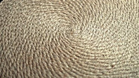 Straw arranged in spiraled circular pattern, showcasing detailed fiber texture Stock Photos