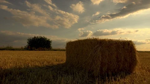 Straw bale sunset pan Stock Footage 92744649