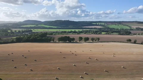 Straw bales in the fields from a drone, Southeast Scotland Stock-Footage 317346136