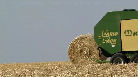 Straw baling with a roll baler Stock Footage 786784
