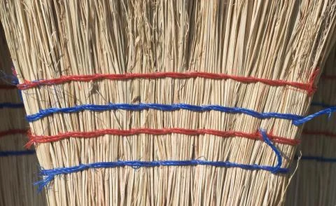 Straw broom Stock Photos