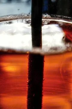 Straw in the Drink with Water Reflection Effect Stock Photos