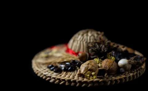 Straw hat on black background Stock Photos