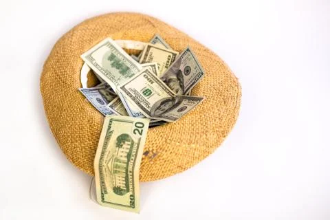 Straw hat with dollars Foto stock