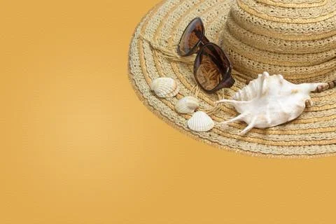 Straw hat on the yellow background 写真素材