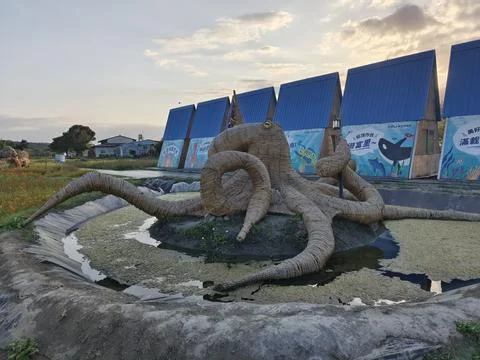 Straw octopus in the park Stock Photos
