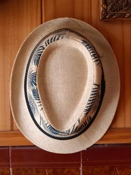 Straw panama hat with tropical pattern band Stock Photos