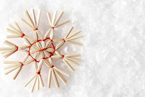 Straw Snowflake on White Snow Background, Christmas Strawy Snow Flake Stock Photos
