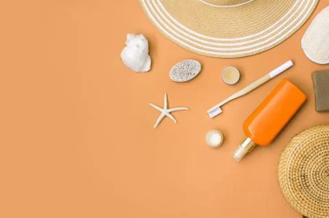 Straw summer hat with seashells and corals Stock Photos