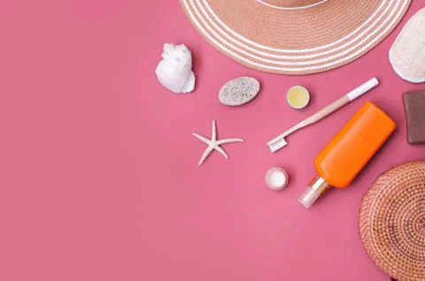 Straw summer hat with seashells and corals Stock Photos