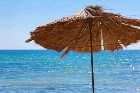 Straw umbrella Stock Photos