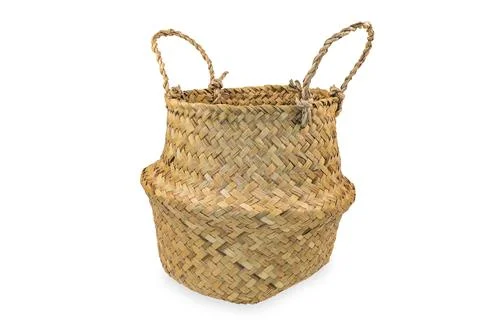 Straw wicker basket on a white background with clipping path.  Stock Photos