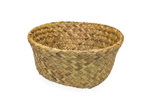 Straw wicker basket on a white background with clipping path.  Stock Photos