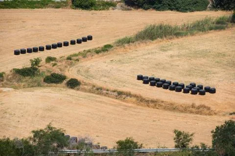 Strawbales in plastic wrap Stock Photos