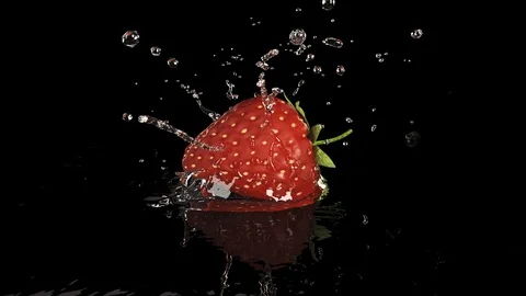 Strawberrie Falls on the Table, Splashing Drops. Slow Motion. Stock Footage 111926069