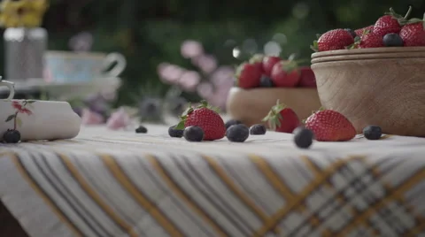 Strawberries and blueberries on table Stock-Footage 67029725