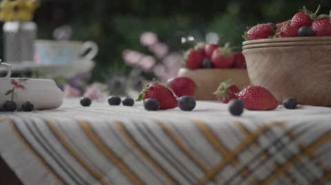 Strawberries and blueberries on table Stock Footage 67029868
