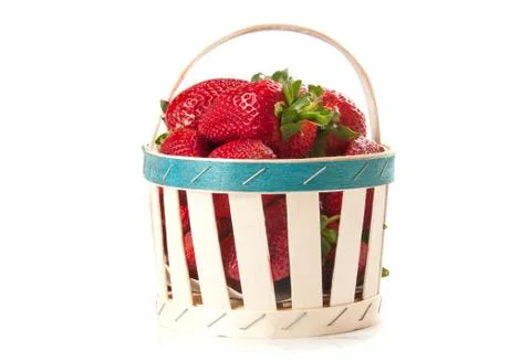Strawberries in basket Stock Photos