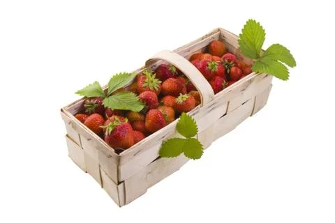 Strawberries in the basket Stock Photos