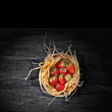 Strawberries in a basket Stock Photos