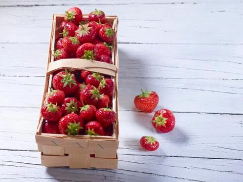 Strawberries in a basket Stock Photos