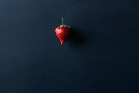 Strawberries on a black background Stock Photos
