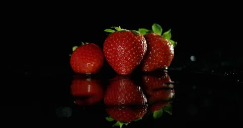 Strawberries on a black table Stock Footage 101526244