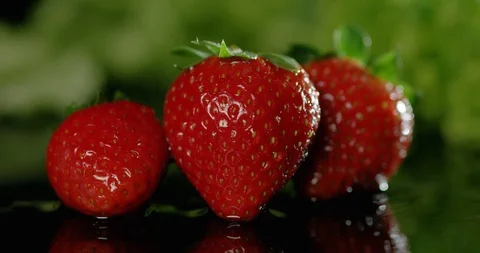 Strawberries on a black table Stock Footage 101526627