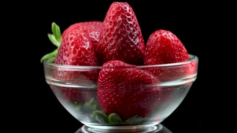 Strawberries Up Close With Black Background Rotating 4K Stock Footage 162954733