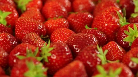 Strawberries close up pan right Stock Footage 11370602
