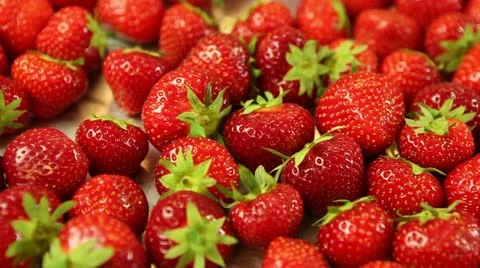 Strawberries close up pan right Stock Footage 11370611