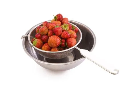 Strawberries in a colander Stock Photos
