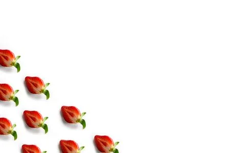 Strawberries in the corner of the frame on a white background. Flat lay Stock Photos