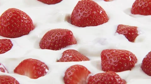 Strawberries in cream Stock Footage 8571664