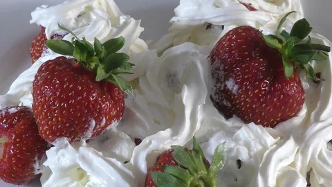 Strawberries with cream Stock Footage 73360090