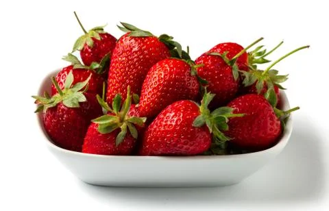 Strawberries on dish Stock Photos