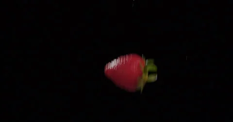 Strawberries fall in slow motion against Black Background 4 库存影片 142187373
