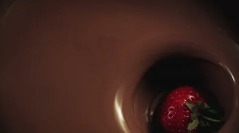 Strawberries Falling into Melted Chocolate Video stock 66730594