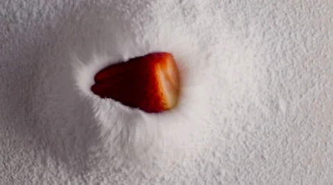 Strawberries falling in powdered sugar. Stock Footage 50127322