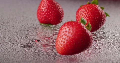 Strawberries Falling in Slowmotion 2K shot on RED Camera Stock Footage 138541874
