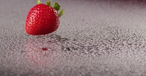 Strawberries Falling in Slowmotion shot on RED Camera 2K Stock Footage 138541917